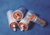 Capacitors for fluorescent lamps